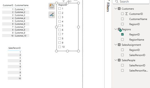 Power BI Report Canvas displaying visualizations and interactive slicers used to filter report data by Salesperson and Region. 